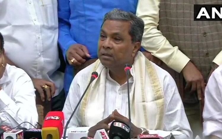 Karnataka CM Siddaramaiah said that the would not accept flowers or shawls give me books